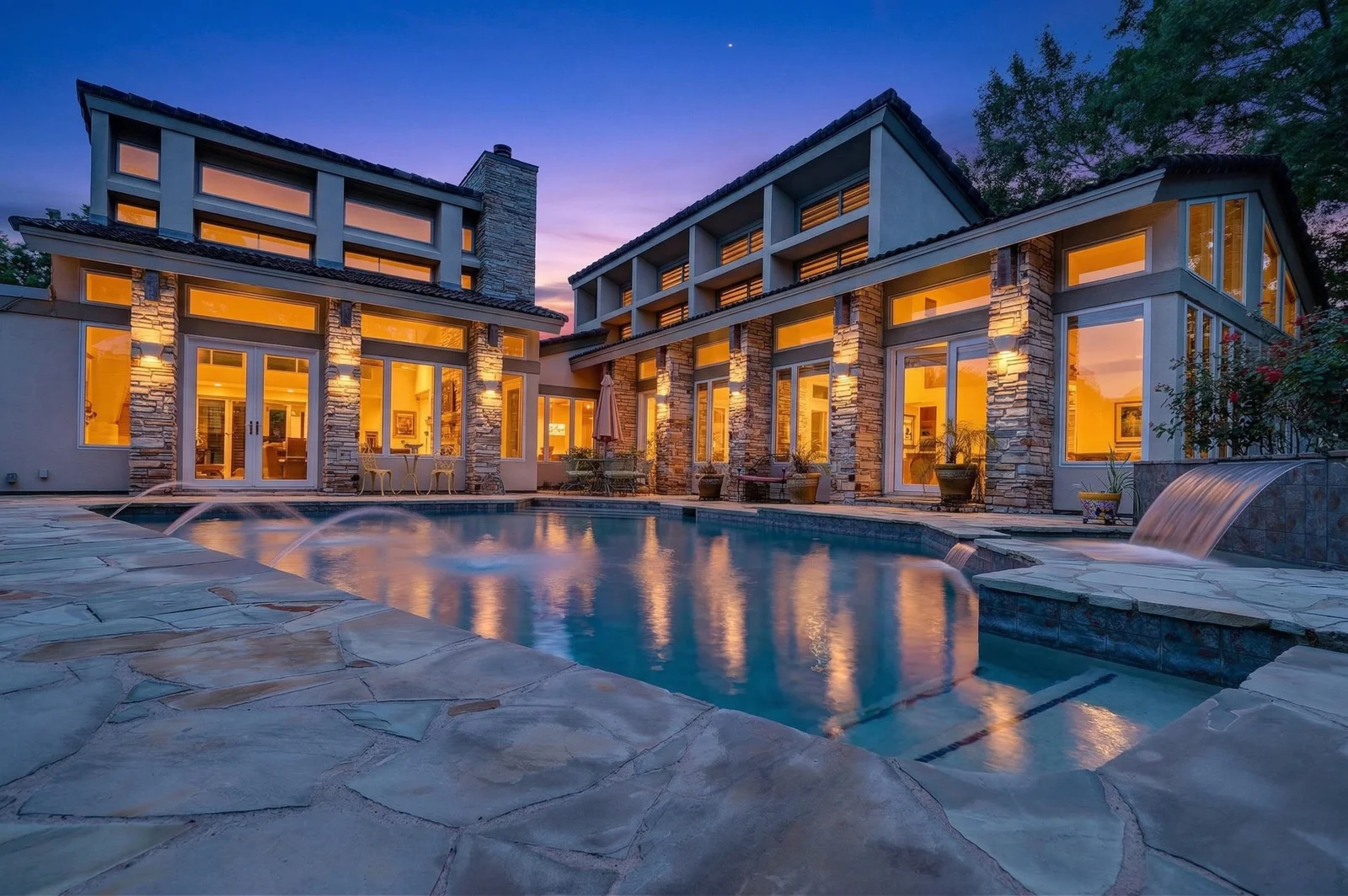 Pool and rear elevation, twilight
