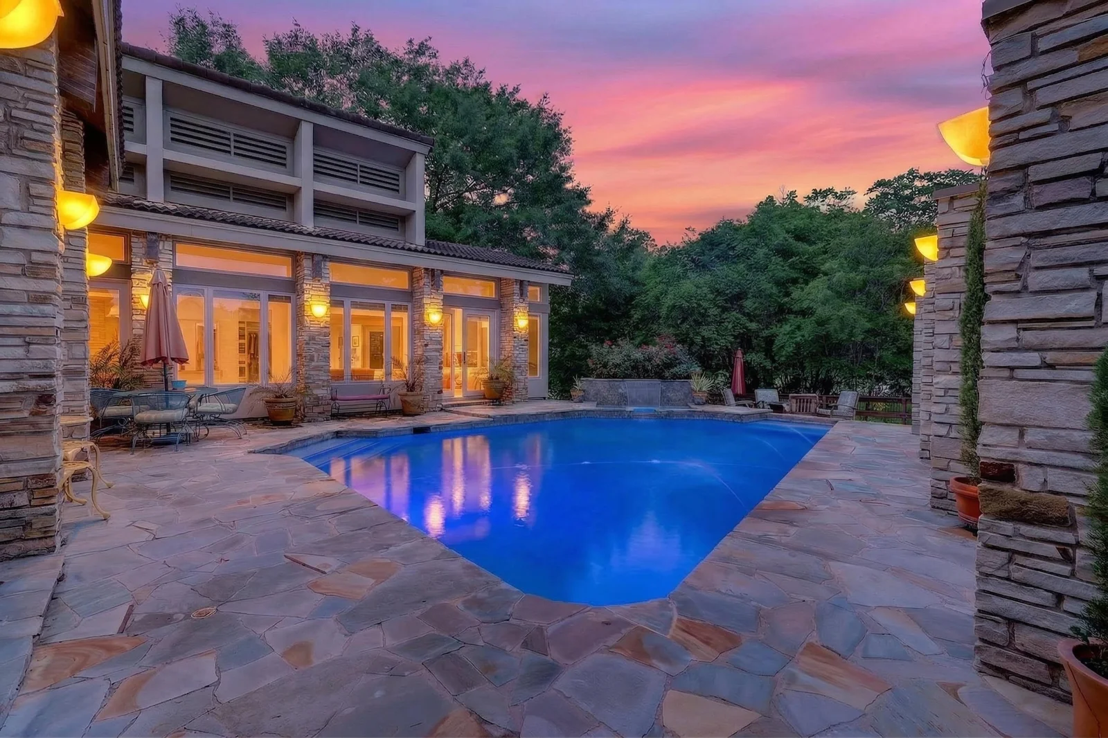 Pool viewed from the covered patio, twilight
