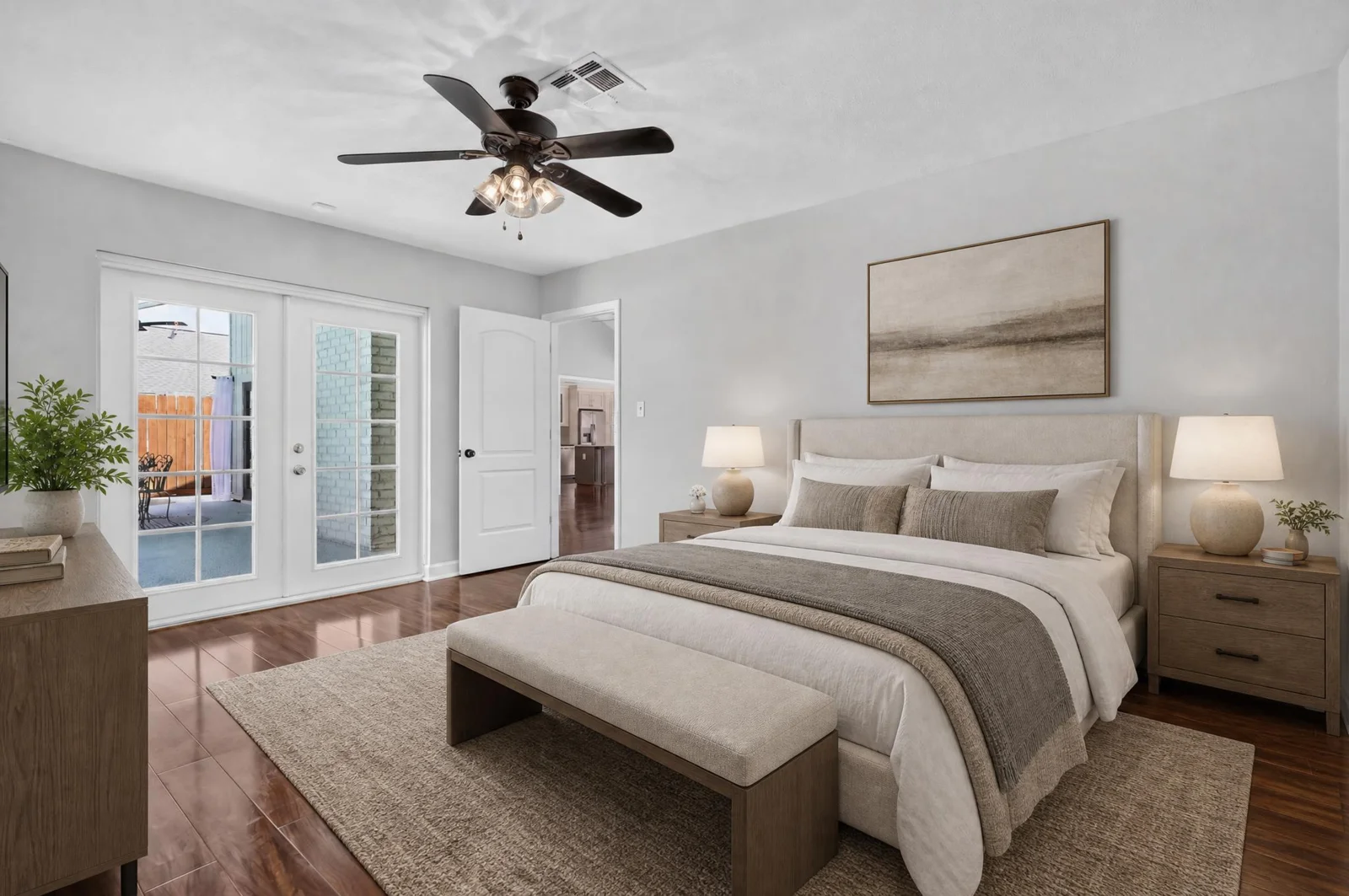 Virtually staged bedroom with patio doors