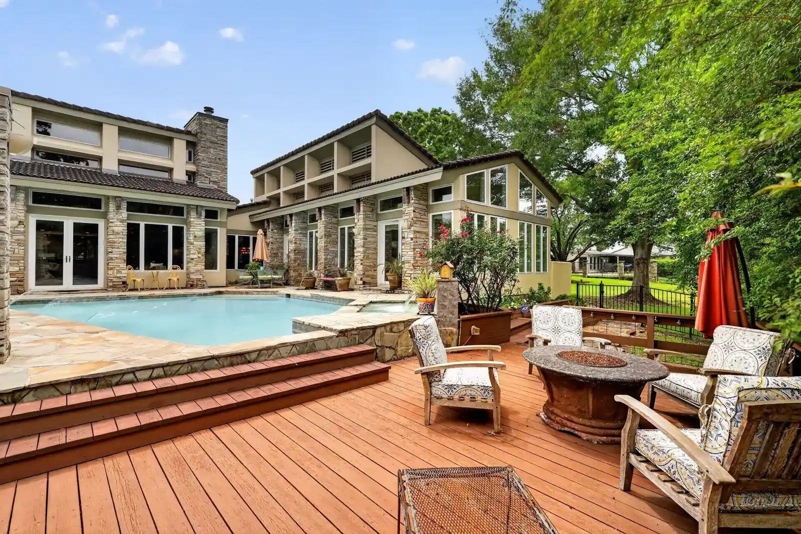 Pool, deck and outdoor seating, daytime