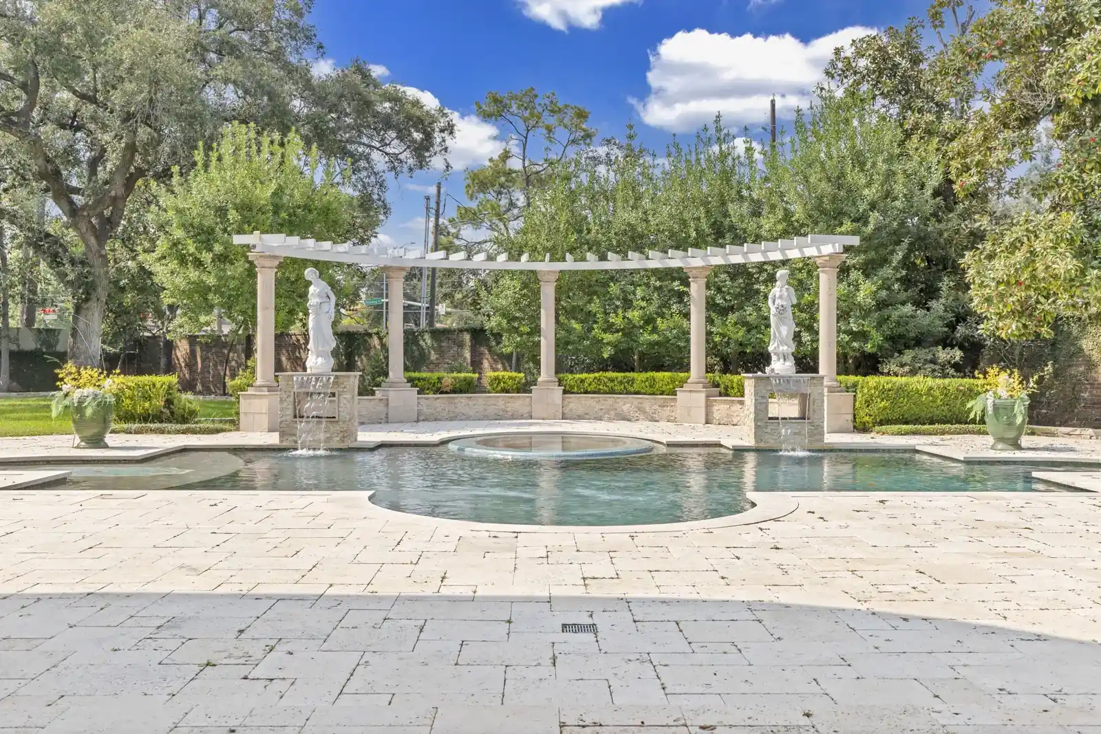 Landscaped backyard with pool, spa and pergola