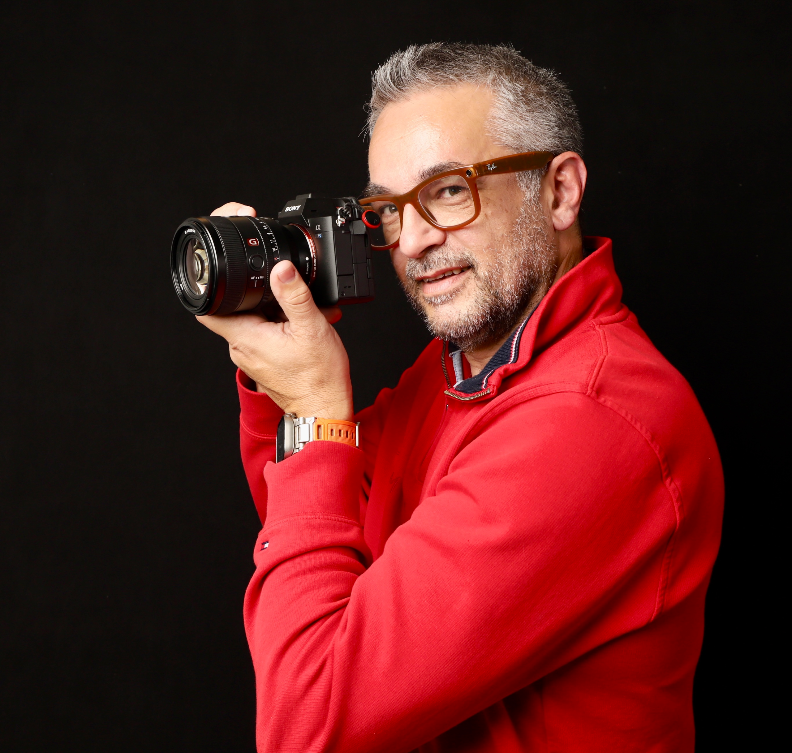 Mario Gerussi holding his camera